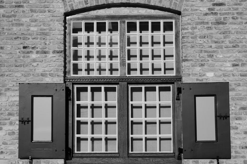 White wooden window shutters